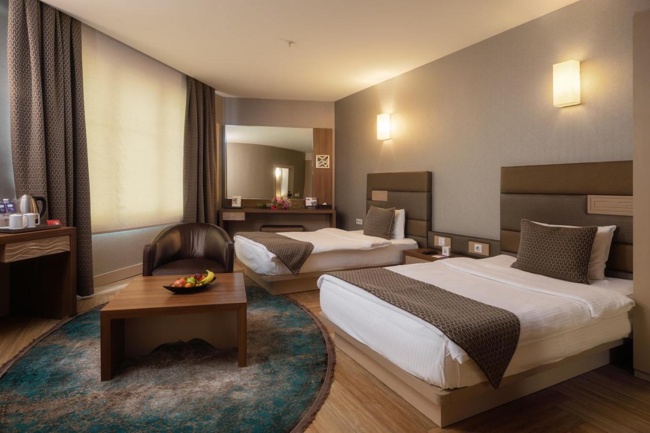 Titanic Hotel & Spa Sulaymaniyah Dış mekan fotoğraf A room at the hotel